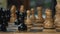 Hand moves white rook and black knight on chessboard closeup