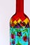 Hand painted colourful bottle.