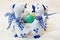 Hand painted Easter eggs in white with blue vase with ducks figures
