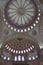 Hand-painted islamic tiles adorn the mosqueâ€™s interior wall and columns. Blue mosque image.