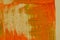 Hand painted multi-layered orange background with scratches