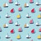 Hand painting sailboats seamless pattern on a light blue background. Kids native design for nursery, fabric and paper.