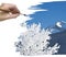 Hand painting snow covered tree