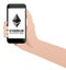 Hand with phone with inscription `Ethereum accepted here`