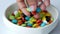 hand pick colorful sweet candy