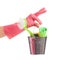 Hand in a pink glove holding silver pail