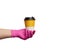 Hand in a pink latex glove holds a paper disposable cardboard cup