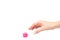 Hand with pink spiky ball for massage, healthcare concept