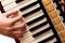 Hand playing accordion