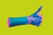 Hand in a pop art collage style in neon bold colors. Modern psychedelic creative element with human palm for posters