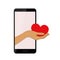 Hand presents red heart from a smartphone