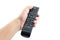 Hand pressing power button on TV remote