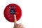 Hand pressing reset button Fire Alarm Equipment on white background