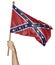 Hand proudly waving the flag of the Confederate States