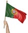 Hand proudly waving the national flag of Portugal