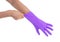 Hand in purple glove