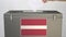 Hand putting paper ballot into ballot box with flag of Latvia. Election related clip