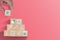 Hand putting wooden cubes stacking of healthcare medicine and hospital icon on beautiful pink background. Health care insurance