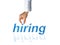 Hand of recruiter advertising for job vacancies to hire for business
