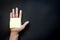 Hand with reminder sticky note ,empty space