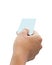 Hand right to hold blue credit card, blank paper on white background