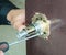 Hand `s man with screwdriver Installs door knob