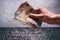 HandÂ´s of young man holding a money. Banknotes on a stone background. Euro money bank notes of different value.