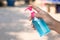 Hand sanitizer, alcohol bottle, held in hand. Disinfecting concept: liquid soap, squeezing blue gel For anti-virus and anti-