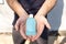 Hand sanitizer alcohol gel rub clean hands hygiene prevention of coronavirus virus outbreak. Man holding bottle of antibacterial