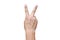A hand shows in signal of scissors on white background. Hand with two fingers up in the peace or victory symbol. Also the sign for