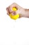 Hand squeezing lemon