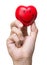 Hand squeezing stress ball in heart shape