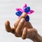 Hand star spinner in fingers.