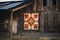 hand-stitched quilt hanging on a rustic barn wall