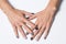 Hand with a stylish gray manicure isolated on