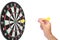 Hand throwing a yellow dart