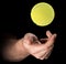 Hand Tossing Tennis Ball