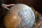 Hand touching earth globe