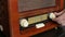 Hand tuning fm radio button. Vintage stereo and control button.