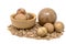 Hand-turned wooden balls in a bowl decorated with sawdust