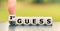 Hand turns a dice and changes the expression `2nd guess` to `1st guess`, or vice versa.