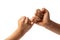 Hand of two young boy making a pinky promise isolated on white background. Promises to do business together.