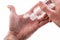 Hand using antibacterial hand sanitizer