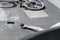 Hand of victim on pedestrian crossing next to bike after dangerous traffic accident