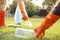 Hand of volunteers collect litter, boy collect garbage