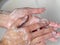 Hand washing with soap. Concept of personal hygiene, countering viruses and microbes