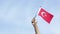 Hand waving flag of Turkey outdoors