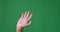 Hand waving and gesturing hello over green screen