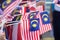 Hand waving Malaysia flag also known as Jalur Gemilang in conjunction with the Independence Day celebration or Merdeka Day.