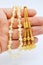 On hand white and gold beads sequenced, short rosary, tespih tesbih